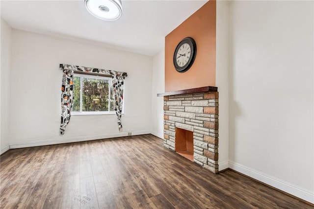 4106 Garden Way, Lawrenceville, PA 15201 - unfurnished living room featuring wood finished floors, a fireplace, and baseboards