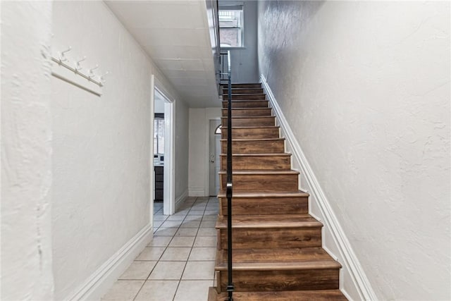 4106 Garden Way, Lawrenceville, PA 15201 - staircase featuring a textured wall and tile patterned floors