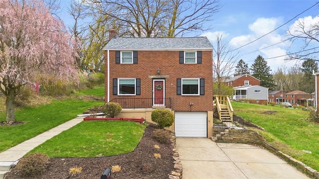 view of front of property with a garage, a front yard, brick siding, a chimney, and concrete driveway