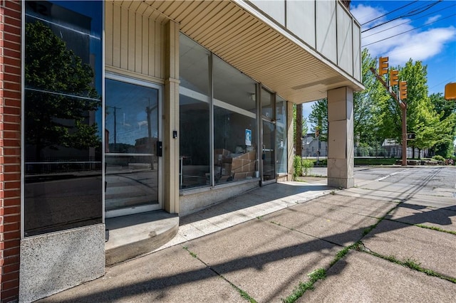property entrance with brick siding