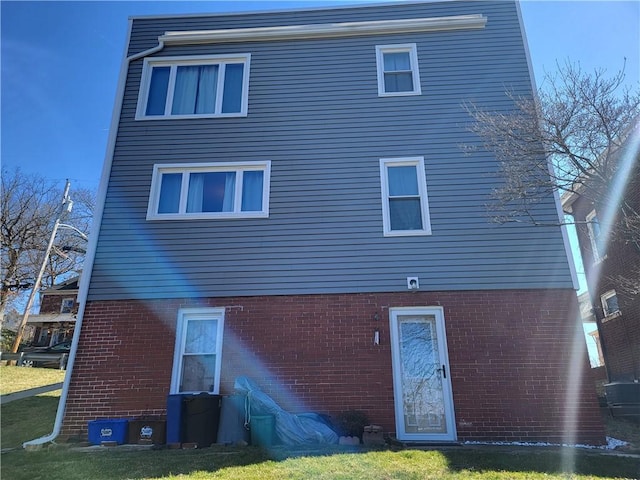 211 Oak St, City Of But Ne, PA 16001 - rear view of property with brick siding