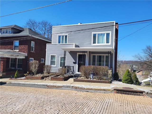 211 Oak St, City Of But Ne, PA 16001 - view of front facade featuring a vegetable garden