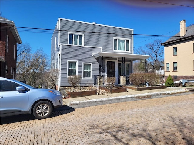 211 Oak St, City Of But Ne, PA 16001 - view of front of home featuring a vegetable garden