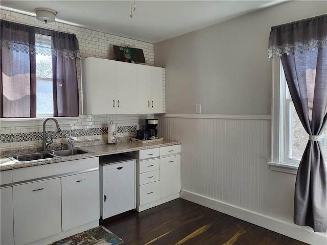 211 Oak St, City Of But Ne, PA 16001 - kitchen with white cabinetry, a wainscoted wall, dark wood-style flooring, light countertops, and a sink