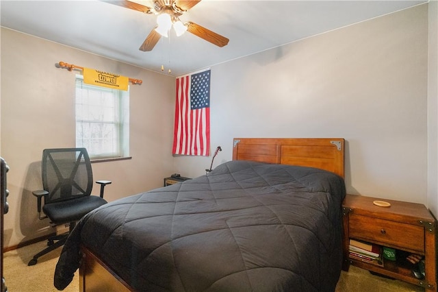 bedroom featuring ceiling fan and carpet flooring