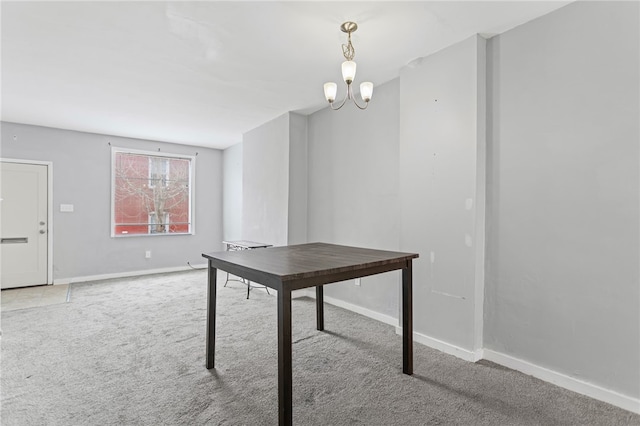 1968 Straubs Ln, Troy Hill, PA 15212 - unfurnished dining area with carpet floors, baseboards, and a chandelier