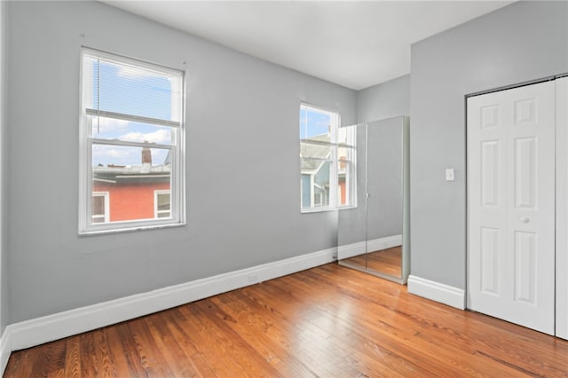 1968 Straubs Ln, Troy Hill, PA 15212 - unfurnished bedroom with baseboards and wood finished floors