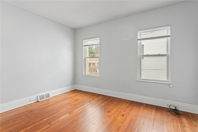 1968 Straubs Ln, Troy Hill, PA 15212 - spare room featuring light wood-style flooring, visible vents, and baseboards