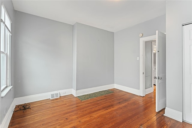 1968 Straubs Ln, Troy Hill, PA 15212 - unfurnished room with a wealth of natural light, visible vents, hardwood / wood-style flooring, and baseboards