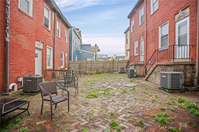 1968 Straubs Ln, Troy Hill, PA 15212 - view of yard featuring a patio area, central AC, and fence