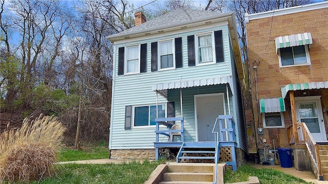 1406 Superior Ave, Brighton Heights, PA 15212 - view of front of property featuring roof with shingles and a chimney