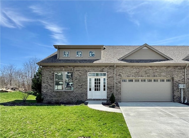 1126 Bayberry Dr, North Strabane, PA 15317 - view of front of home featuring roof with shingles, a front yard, brick siding, an attached garage, and concrete driveway