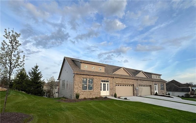 1126 Bayberry Dr, North Strabane, PA 15317 - view of front of home with concrete driveway, brick siding, a garage, and a front lawn