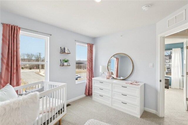 202 Cherry Tree Dr, Twp Of But Sw, PA 16001 - bedroom featuring baseboards, a nursery area, visible vents, and light colored carpet