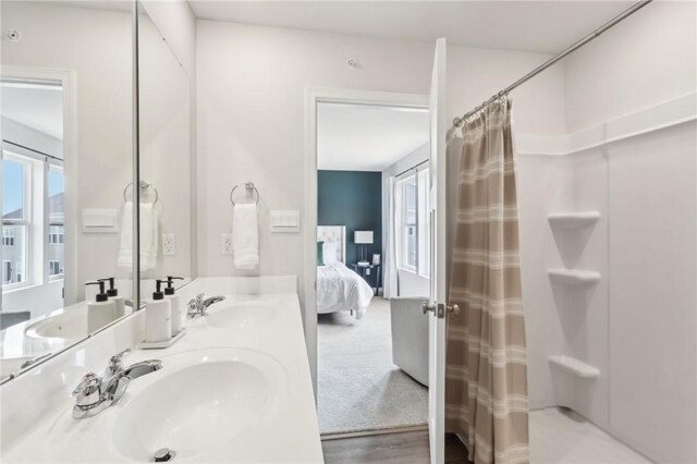 202 Cherry Tree Dr, Twp Of But Sw, PA 16001 - ensuite bathroom featuring a shower with shower curtain, double vanity, ensuite bathroom, and a sink