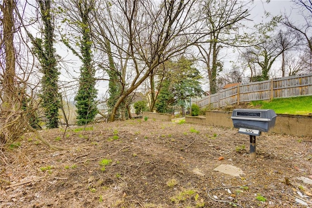 view of yard with fence