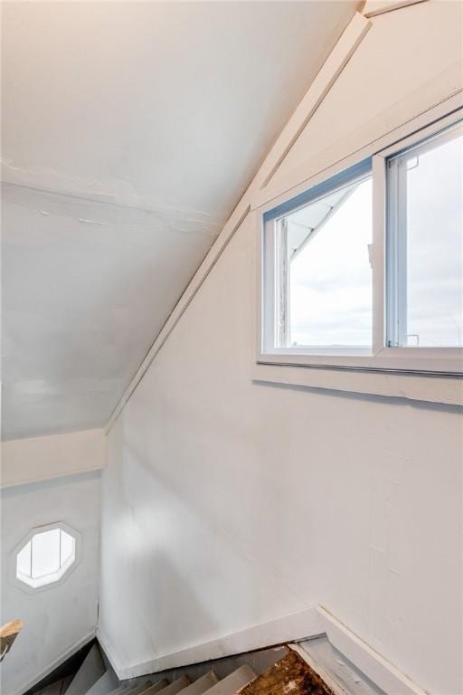 bonus room featuring vaulted ceiling