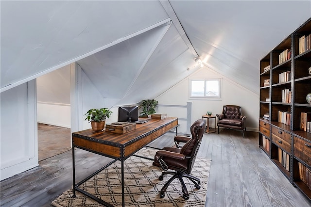 office featuring wood finished floors and lofted ceiling