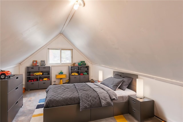 bedroom featuring vaulted ceiling