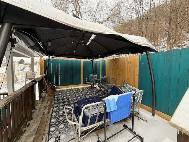 view of patio / terrace featuring a gazebo and fence