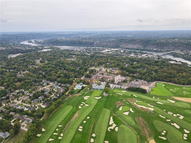 birds eye view of property with a residential view, view of golf course, and a water view