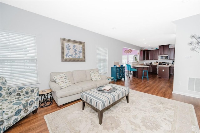 605 Skyline Ct, Irwin, PA 15642 - living room with visible vents and wood finished floors