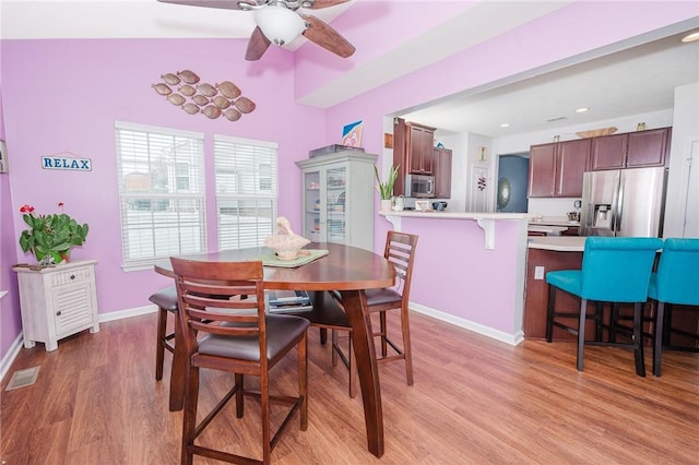 605 Skyline Ct, Irwin, PA 15642 - dining room with light wood-style floors, baseboards, a ceiling fan, and visible vents