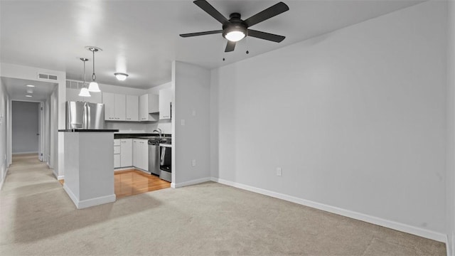 1814 Kenzie Dr, Robinson Twp Nwa, PA 15205 - kitchen featuring baseboards, light carpet, white cabinetry, dark countertops, and stainless steel appliances