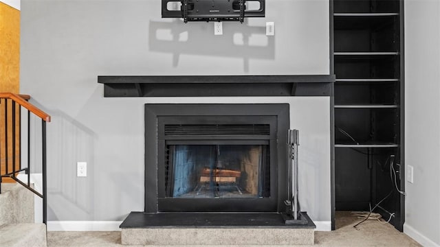 1814 Kenzie Dr, Robinson Twp Nwa, PA 15205 - interior details featuring carpet flooring, baseboards, and a fireplace with raised hearth