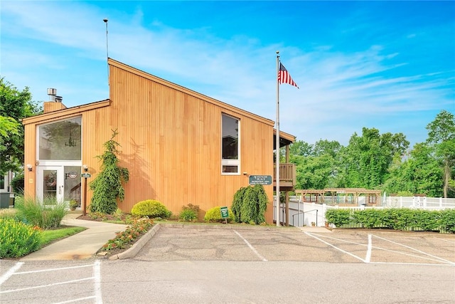 1814 Kenzie Dr, Robinson Twp Nwa, PA 15205 - view of building exterior with uncovered parking and fence
