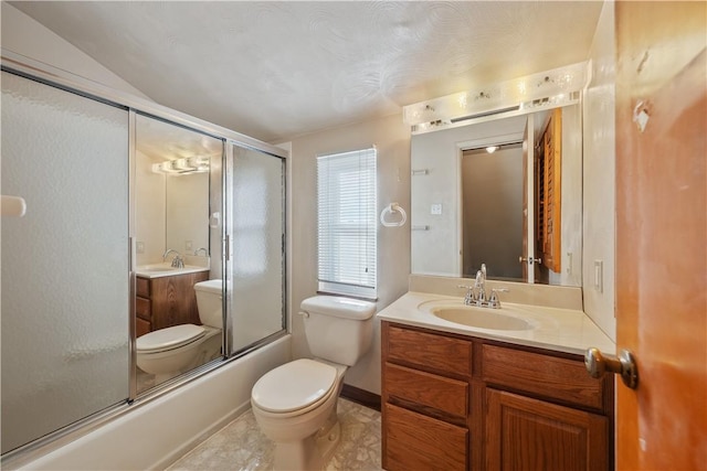 full bathroom featuring tile patterned flooring, enclosed tub / shower combo, vanity, and toilet