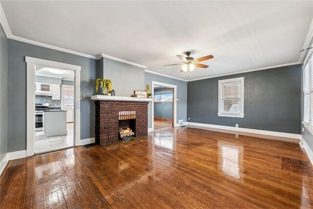 1634 Mcminn, Aliquippa, PA 15001 - unfurnished living room featuring wood-type flooring, a brick fireplace, baseboards, and ceiling fan