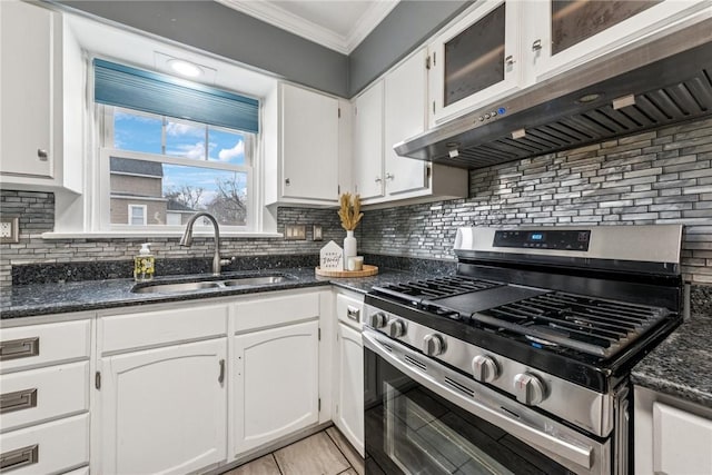1634 Mcminn, Aliquippa, PA 15001 - kitchen with a sink, ornamental molding, stainless steel gas range, under cabinet range hood, and white cabinetry