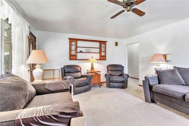 10110 Rinaman Rd, Mccandless, PA 15090 - carpeted living room featuring a ceiling fan and baseboards