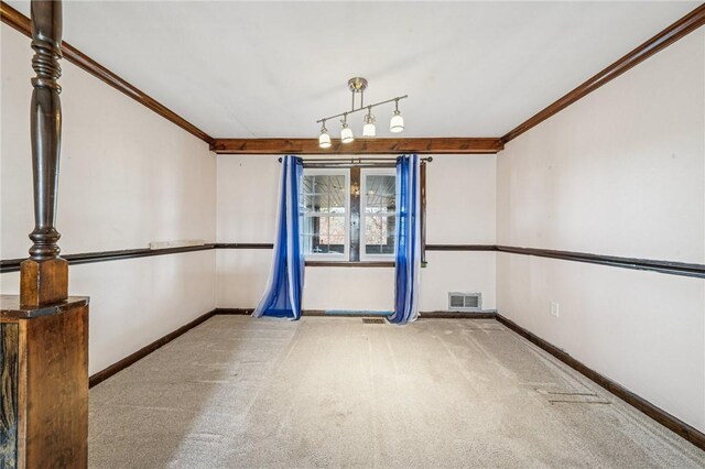 2096 Ramsey Rd, Monroeville, PA 15146 - spare room with ornamental molding, baseboards, carpet, and visible vents