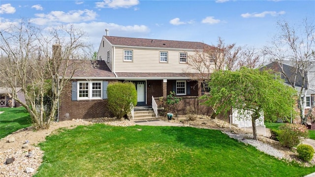 2096 Ramsey Rd, Monroeville, PA 15146 - traditional-style house with a front yard and brick siding