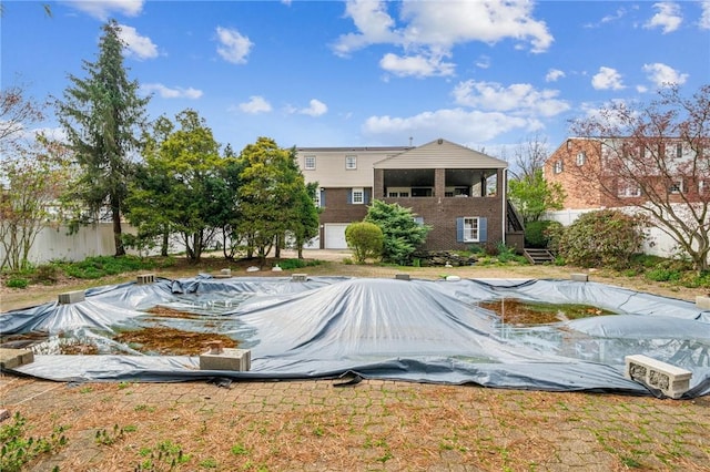 2096 Ramsey Rd, Monroeville, PA 15146 - exterior space with a lawn, a covered pool, fence, and stairs
