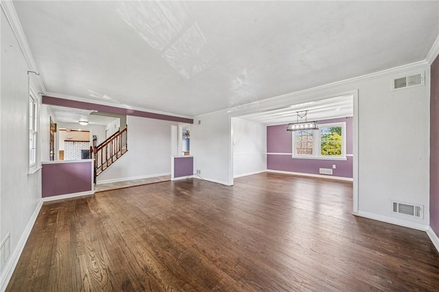 2096 Ramsey Rd, Monroeville, PA 15146 - unfurnished living room featuring wood finished floors, baseboards, visible vents, and stairway