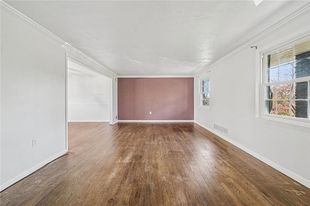 2096 Ramsey Rd, Monroeville, PA 15146 - spare room with ornamental molding, visible vents, plenty of natural light, and wood finished floors