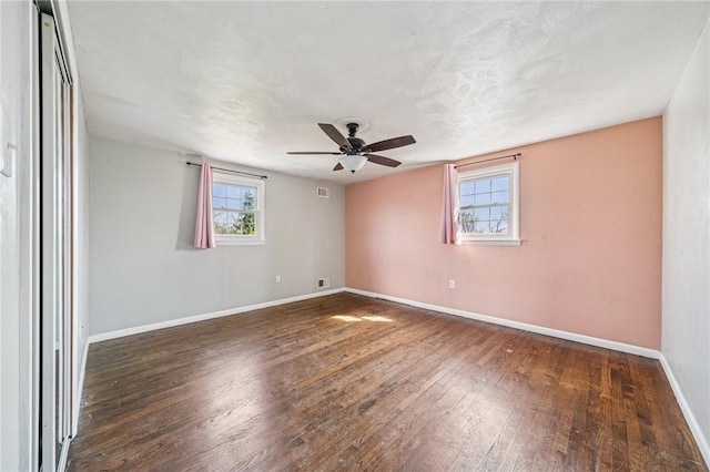 2096 Ramsey Rd, Monroeville, PA 15146 - unfurnished room with ceiling fan, baseboards, visible vents, and hardwood / wood-style flooring