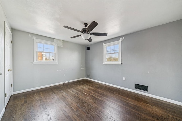 2096 Ramsey Rd, Monroeville, PA 15146 - empty room featuring wood finished floors, baseboards, visible vents, and a wealth of natural light