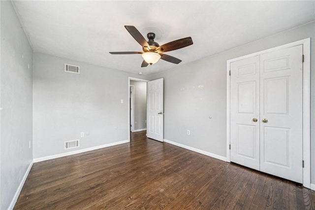 2096 Ramsey Rd, Monroeville, PA 15146 - unfurnished bedroom with visible vents, baseboards, and dark wood-style floors