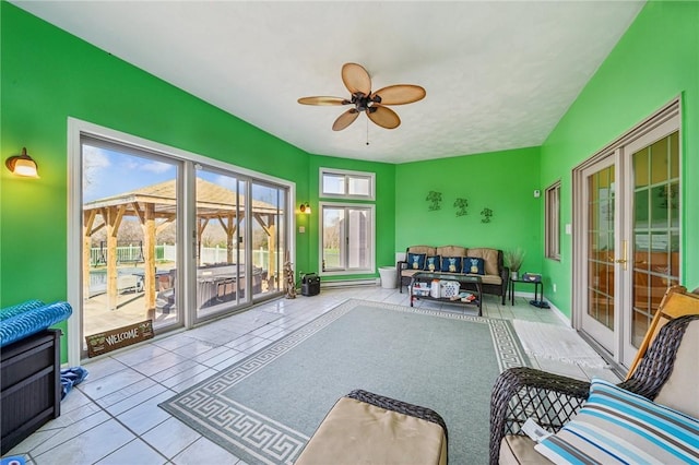 221 Pitgas Rd, Clarksville, PA 15322 - tiled living area featuring french doors and a ceiling fan