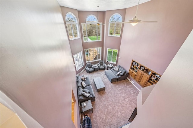 221 Pitgas Rd, Clarksville, PA 15322 - carpeted living area with a high ceiling, ceiling fan, and baseboards