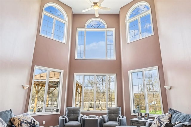 221 Pitgas Rd, Clarksville, PA 15322 - living room featuring ceiling fan, a towering ceiling, and a wealth of natural light