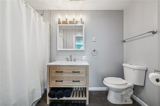 221 Pitgas Rd, Clarksville, PA 15322 - full bathroom featuring visible vents, baseboards, toilet, vanity, and tile patterned floors