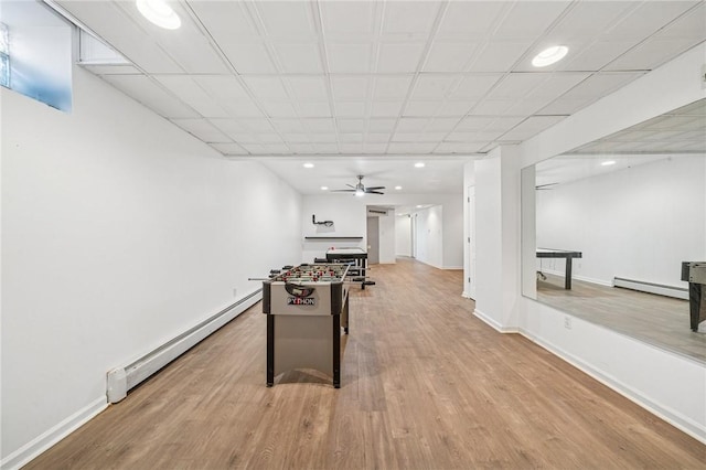 221 Pitgas Rd, Clarksville, PA 15322 - rec room with baseboard heating, light wood finished floors, a ceiling fan, and recessed lighting