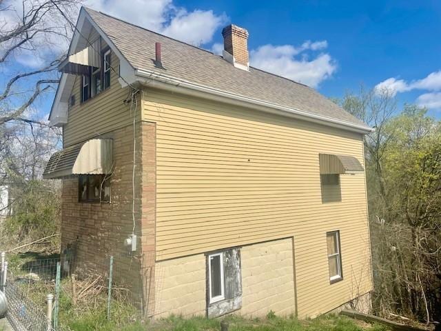 504 Chestnut St, Monessen, PA 15062 - view of side of home featuring a chimney