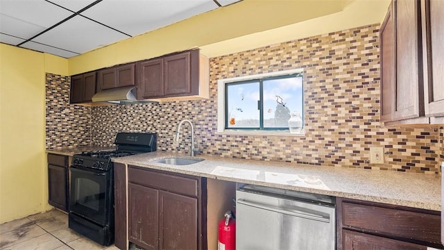 kitchen with tasteful backsplash, dishwasher, a sink, under cabinet range hood, and black gas range