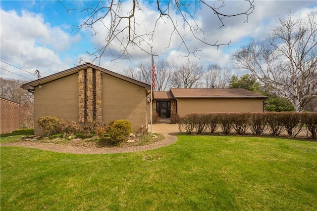 1805 Educational Dr, White Oak, PA 15131 - rear view of house with brick siding and a lawn